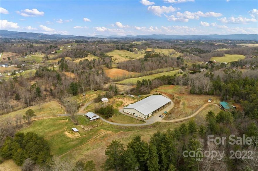 The parcel includes a house, barn/stables and dormitory as well as additional build sites or room for expansion. This property is set up perfect for horses with equestrian facilities already in place. There is ample room for organic farming or homesteading. This property offers an array of uses, bring your vision. There are no HOA rules or covenants. The boundaries are marked with pink tape.