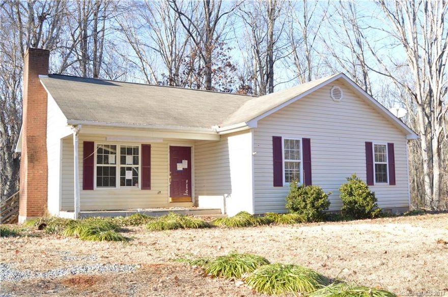 Looking for acreage at then this is the home for you.  Open living room with fireplace, and large Master Bedroom.  Over 5 acres of land with large out building.  Home is sold as is where is.