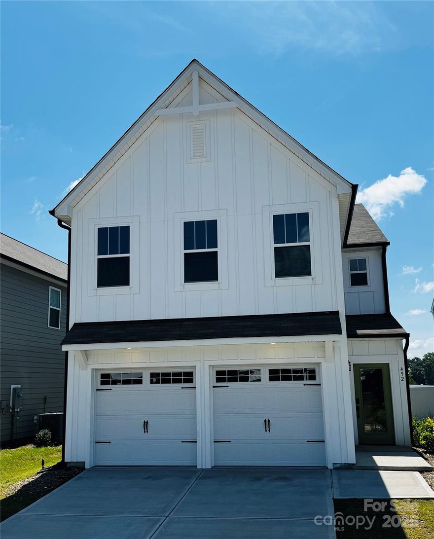 Ask about loan program with PNC for $11,000 closing cost credit. This beautifully maintained 4-bed, 3-bath home offers an open-concept layout designed for modern living. The main floor features a private study, a guest bedroom with full bath, and a stylish kitchen that opens to the dining area and great room—perfect for entertaining. The kitchen is a chef’s dream, complete with an extended quartz island, sleek tile backsplash, stainless steel appliances, and upgraded cabinetry. Upstairs, you'll find a spacious primary suite with a luxurious ensuite bath and walk-in closet, along with two additional bedrooms, a full bath, convenient laundry room, and a versatile loft space—ideal for a second living area, playroom, or home office. Designer touches throughout include contemporary lighting, in-ground irrigation, and thoughtfully curated finishes. Located in desirable Wilkerson Place, this home is close to top-rated schools, historic downtown York, and unique local shops.