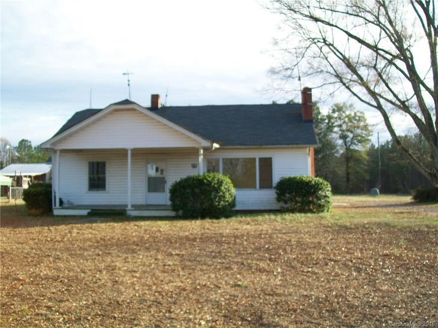 2 bedroom 2 bath on 1.9 acres with large living with hardwoods and fireplace.  Large kitchen and dining room.   Newer roof, new well.  Great location to Charlotte or Rock HIll.