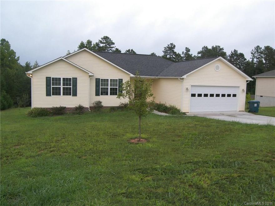 3BD/2BA, 1640 sq ft, quiet cul-de-sac neighborhood, in the county, but convenient to dining, shopping & medical area,  Great room with gas log fireplace, formal dining room, spacious master suite with walk-in closet, master bath has separate shower & tub, large secondary bedrooms, hardwood & tile floors, rear deck overlooks private back yard, double attached garage, covered front porch