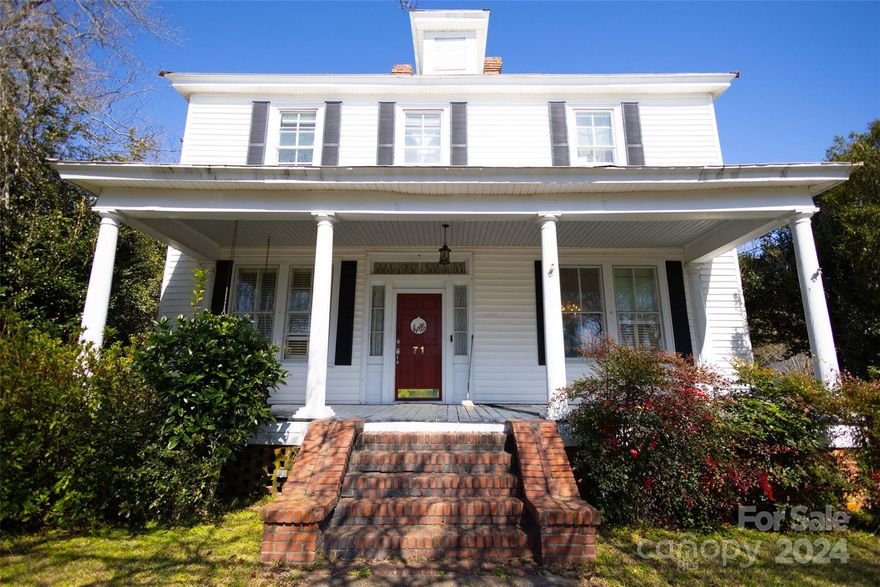 Welcome to a piece of history! Nestled in a quaint street, this beautiful 1925 colonial home exudes classic charm and timeless elegance. Boasting a distinctive architectural style, this residence seamlessly blends historic character with modern conveniences.  Step through the front door into a living testament to a bygone era. Original hardwood floors, crown molding, and a grand staircase showcase the craftsmanship of the Roaring Twenties.  The home features 5 generously sized bedrooms, each with its own unique character.  There are 2 outbuildings in the backyard.  Both have electricity.  The back shed is equipped with a sink and running water along with an attic for storage and an A/C unit.  Don't miss the opportunity to own a piece of history with this enchanting 1925 colonial home. Schedule a showing today and step into a residence where the past meets the present seamlessly.  Home needs some TLC but offers boundless potential for those with a vision.