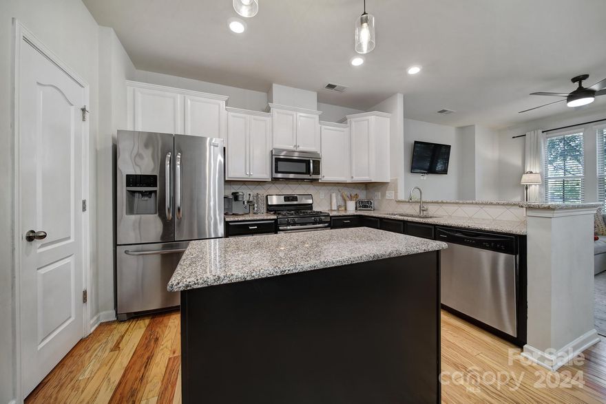 Welcome to 5020 Mockernut Lane in wonderful Indian Land, SC! This home has it all: 3 bedrooms; 2.5 bathrooms; 
 an updated kitchen with granite countertops, tile backsplash, newly painted cabinets, and stainless steel appliances; open living spaces AND a fenced-in backyard! The primary bedroom is conveniently located on the main floor of the home, with the two spacious additional bedrooms, laundry and large loft located upstairs. This home is the largest floor plan in the community and, on top of all of the features already mentioned, has wonderful closet space, too! The Grove is an awesome community within walking distance to shopping and restaurants at The Promenade at Carolina Reserve as well as conveniently located near several grocery stores. The community also has an in-ground pool - perfect for these hot Carolina summers! Schedule your showing today. You don't want to miss this one!