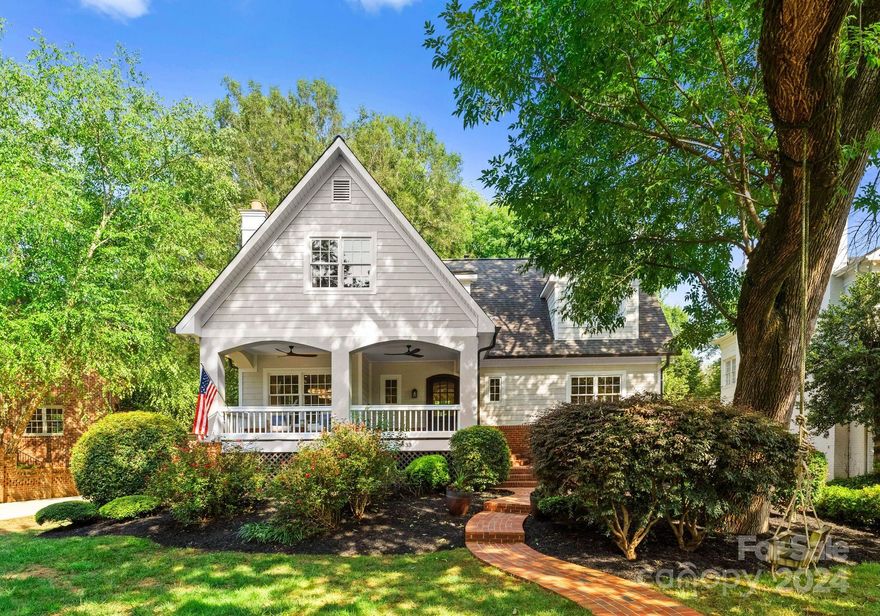 In coveted Eastover, this home rests on a 1.1 acre retreat, offering the best in historic charm and modern luxury living. Thoughtfully updated throughout, the sun-soaked open floorplan boasts 9’ ceilings, and over 180 sqft of windows overlooking the backyard. New amenities include the perfect chef’s kitchen with oversized 11’ matte marble island, 48” Wolf Range and double wall ovens, SubZero refrigerator, dual dishwashers, pellet ice maker, custom coffee station, and hidden door walk-in pantry. Butler’s pantry with SubZero bev fridge and wine chiller. Natural hardwood floors throughout and were just refinished on the second level. Upstairs is a fully renovated primary suite with dual closets, gorgeous bathroom with floor to ceiling tile, and large veranda for relaxing. Brand new laundry room and updated secondary bathrooms. Over 1200 sqft of basement living space perfect for a home gym, shop/studio, play area, or wine cellar.  Many more amazing features to this home!