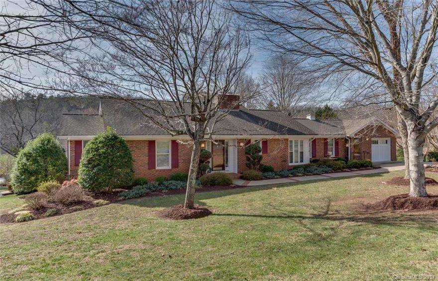 IMPECCABLE 1-Level Living w/TONS of UPGRADES! 2 Fireplaces, Upgraded Appliances, LivRoom w/Cathedral clg & skylights opens to DinRoom w/Geppetto Built-ins + add'l DEN/FamRoom, 1/2 bath & Laundry leading to HUGE 850 sqft Trex Deck w/retractable awning system! Tile Flooring throughout, w/Custom Tile Showers & Glass Enclosures in both Full Baths. 1-car Attached Garage + separate Large Workshop area & a 1-car Detached Garage w/Lower Concrete Drive. 3rd Bedrm used as office w/Murphy Bed. Corner Lot!