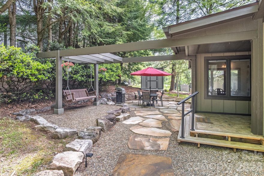Welcome to 22 Dalonigei Ct! This fully renovated, fully furnished, move-in ready 2BR/2BA in gated Connestee Falls is just outside of downtown Brevard NC, the Land of Waterfalls! This home was extensively updated with quality materials, such as smart siding, architectural shingle roof, gutters with leaf covers, HVAC, and a fully encapsulated crawlspace with new dehumidifier mean the most difficult and complicated items have already been handled. The kitchen has also been updated with new lights and an island for additional work space and seating. Both baths were updated with new vanities, toilets, flooring, and light fixtures. Bedrooms have fresh new carpet and paint. Single floor living with minimal stairs makes it easy to navigate. The beautiful flagstone and boulder patio is perfect for outdoor entertaining and relaxing, complete with new drainage work, fresh landscaping, and a new TufShed - the space is both functional and tasteful. Connestee Falls is loaded with amenities — private lakes, pool, golf, tennis, and miles of trails. The clubhouse and Lake Atagahi are right down the road; have a cook out, walk to the park, or get on the green - the 18-hole George Cobb-designed golf course is visible and easily accessible from the property. Downtown Brevard is about 8 miles out, Pisgah National Forest and DuPont State Forest are both just minutes away. Headwaters and Gorges parks are also in-county. Check out the French Broad River for renowned trout fishing, down East Fork Rd nearby. Located 45 Minutes from Asheville Regional Airport. This was a short term vacation rental named "Deer Haven", with a 5-star guest rating; everything to start that back up is included. Make sure to check out Lake Atagahi and all it offers before you leave, right down the road. With short-term rentals allowed, this works equally well as a primary residence, second home, or investment property. Schedule your showing today!
