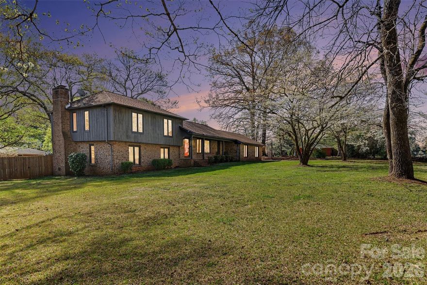 Spacious tri-level home on a 0.85-acre corner lot with detached workshop/garage, fenced backyard, and unique outdoor features you won’t find anywhere else. This property offers a functional layout with multiple living areas, ideal for buyers needing flex space, home office options, and room to spread out.

The updated kitchen features quartz countertops, oversized island, and double convection ovens, perfect for entertaining and everyday living. Upper level includes 3 bedrooms with separation from main living areas for added privacy.

Lower level provides a large den with wood-burning fireplace, half bath, and flex/storage room, ideal for remote work, gym, or additional living space.

Outdoor living is a standout with a private fenced backyard and expansive deck, plus a custom RC racetrack with a fire pit centerpiece, creating a one-of-a-kind setup for hobbyists or entertaining.

Property also features mature landscaping adding character and curb appeal. The detached garage/workshop with separate power meter is perfect for business use, storage, or hobby space.

Major updates include PVC plumbing and upgraded electrical panels, offering long-term peace of mind. Conveniently located less than 10 minutes to interstate access, shopping, and dining, while benefiting from lower county taxes.

Rare opportunity to own a large lot property with workshop, flex space, and unique outdoor amenities in a convenient location.