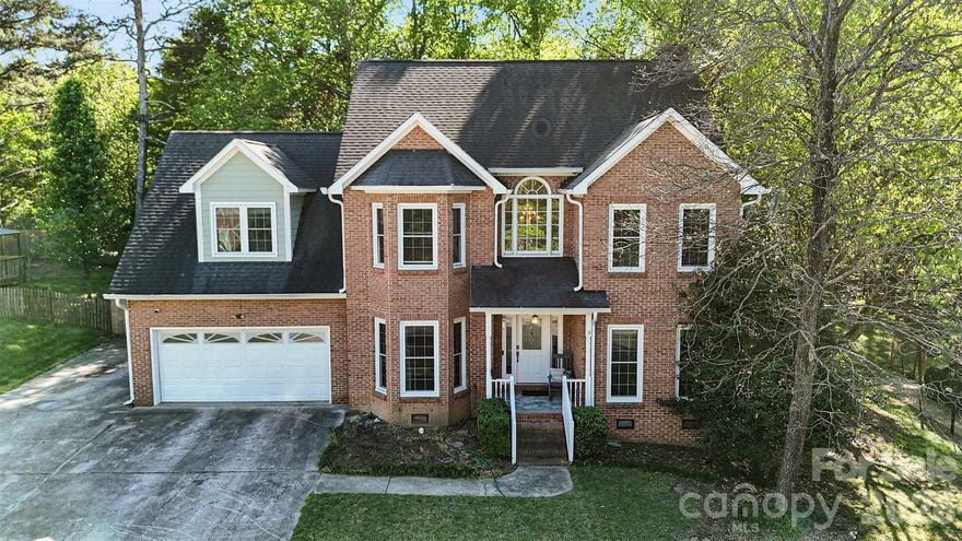 Nestled on a quiet cul-de-sac in the established Riverwood Plantation community, this spacious home offers a blend of comfort, flexibility, and thoughtful design in a private, wooded setting. The classic brick-accented exterior and welcoming front entry set the tone, while mature trees and a fenced backyard create a sense of seclusion and space.

Inside, the home features a bright and functional layout with generous living areas that flow easily from one space to the next. Natural light fills the main living room, anchored by a fireplace that adds warmth and character, while the adjoining dining and kitchen areas provide an ideal setup for both everyday living and entertaining. Additional main-level spaces offer versatility for a home office, sitting room, or flex use to suit your lifestyle.

A standout feature of this property is the fully handicap-accessible addition located at the rear of the home. Designed for comfort and independence, this private suite includes its own bedroom and full bathroom along with a separate entrance. A dedicated exterior chair lift provides easy access, making this space ideal for multigenerational living, guests, or anyone needing enhanced accessibility without compromising privacy.

Upstairs, the home continues to offer ample space with well-sized bedrooms and a primary suite designed as a comfortable retreat. Each room feels bright and inviting, with plenty of flexibility for a variety of needs.

The outdoor space enhances the home’s appeal even further, with a deck overlooking the backyard and wooded surroundings, creating a peaceful place to relax or gather. Residents of Riverwood Plantation enjoy access to neighborhood amenities including a community pool and recreation area, perfect for spending time outdoors and connecting with neighbors. The surrounding area offers convenient access to shopping, dining, and everyday essentials, while still maintaining a quiet, residential feel that makes coming home something to look forward to.