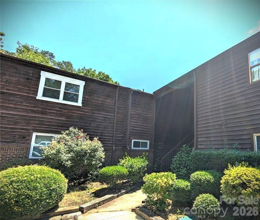 REFLECTIONS!  Wonderful and spacious 2nd floor unit/condo overlooking the water !! 2 bedrooms and 2 baths , wonderful living room with real wood burning  fireplace. and private deck w/storage room. that has access from the Primary bedroom as well as the living room. Spacious kitchen with breakfast bar and tiles countertops. INVESTORS only please unit is rented  till 5/31/2026. Community has a pool and clubhouse!