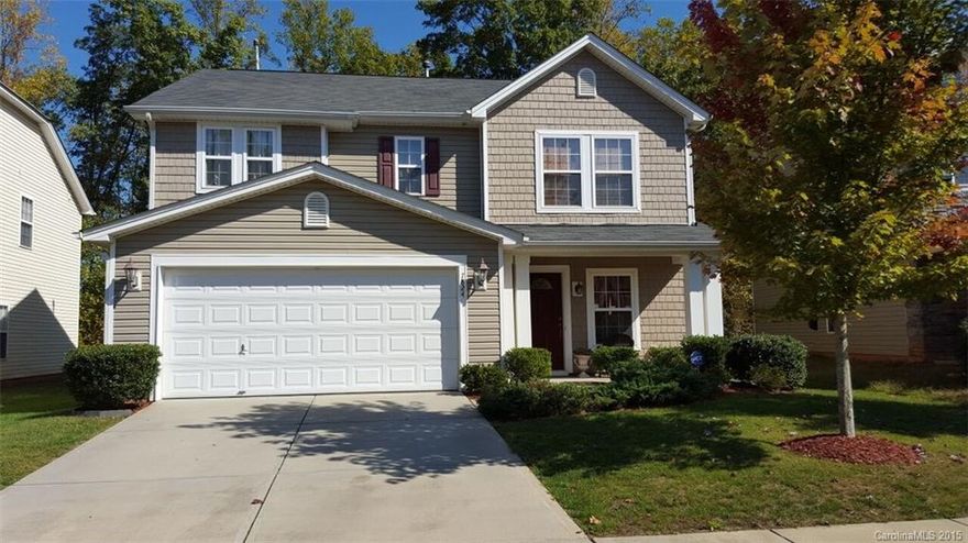 This immaculate, well maintained home has an inviting covered front porch that leads into an elegant dining/greeting room, which extends into an open family room with a cozy fireplace, then follows into a large kitchen offering tons of generous counter space.  Directly off of the kitchen is an inviting covered double sized patio perfect for entertaining & relaxing in a serene outdoor atmosphere.  Beautiful, new, laminate wood flooring abounds on entire 1st floor & upstairs loft area & hallway.