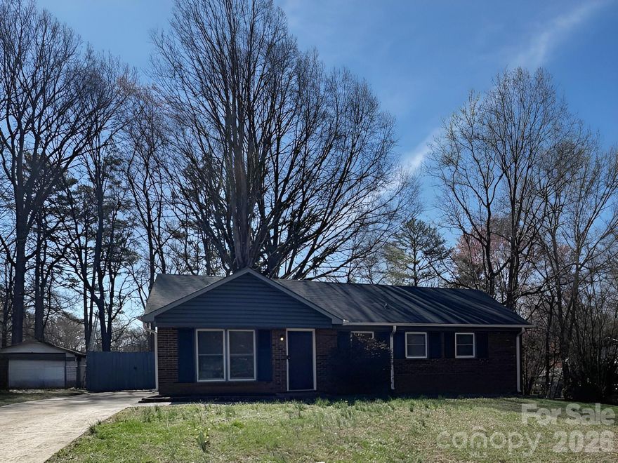 Charming 4 Bedroom 1.5 Bathroom Home w/NO HOA Located in the Quiet Cabarrus Woods Neighborhood. Home features an open floorplan with upgraded laminate wood floors throughout the common areas. Kitchen features plenty of cabinet and countertop space with stainless steel appliances including the refrigerator, range, dishwasher and range hood. Home also features 4 bedrooms, a large fenced backyard, a firepit, a storage shed, upgraded thermostat and chair rail trim throughout. Exterior patio is extended and enclosed which is perfect family and friends. Perfect location just minutes from all daily necessities including I-485, UNC Charlotte, parks, entertainment, shopping, restaurants, schools and expressways. Call to schedule a showing today!