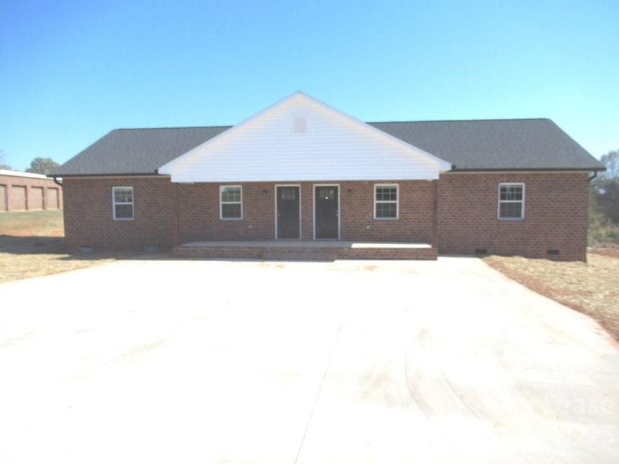Check out this new brick duplex conveniently located 10 minutes on the southwest side Lincolnton with almost 1000 square feet.  This one offer a large Den, nice kitchen with granite counters and all appliances.  Vinyl Plank Floors, ceiling fans, laundry room. Two good sized bedrooms and 1 bath.  Covered front porch & rear patio.  Located in a quiet neighborhood with large yard.  Application is required to be considered for lease.  Pets allowed are small breed only.