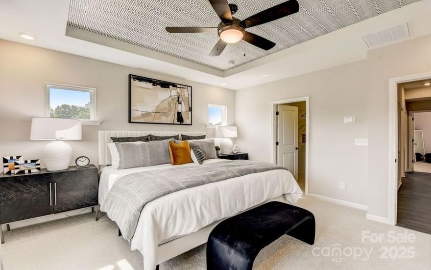 What's Special: End Unit | Corner Lot | No Rear Neighbors | 1st Floor Guest Suite.
New Construction - Ready Now! Built by America's Most Trusted Homebuilder. Welcome to the Vail II at 555 Silver Star Boulevard in Indian Trail Townhomes! This three-story design offers space and style for modern living. The first floor welcomes you with a private bedroom and bath and two-car garage. Upstairs, the heart of the home shines with an open-concept layout where the great room, dining area, and kitchen flow together seamlessly. Step out onto the deck for fresh air and extra space to gather. A powder room adds ease for guests. On the third floor, find three bedrooms, including a luxurious primary suite with tray ceiling, dual vanities, and a generous walk-in closet. Laundry and a full bath complete this level, making everyday living simple and organized. Welcome to Indian Trail Townhomes, where comfort and convenience come together in a vibrant location. Enjoy easy access to US-74 and I-485, top-rated Union County Public Schools, and a variety of shopping, dining, and entertainment options in nearby Indian Trail and Matthews. Nature and beauty surround the community with Chestnut Square Park and Colonel Francis Beatty Park just minutes away. You’ll be close to major conveniences including employment centers, Atrium Health Union West, and nearby highways. Local shopping and dining possibilities are endless with Sun Valley Commons, Sycamore Commons, and The Shoppes at Hanfield Village all within a short drive. Families will appreciate proximity to sought-after schools including Indian Trail Elementary, Sun Valley Middle, and Sun Valley High School. Additional Highlights include: downstairs 4th bedroom with full bathroom. Photos are for representative purposes only. MLS#4324500