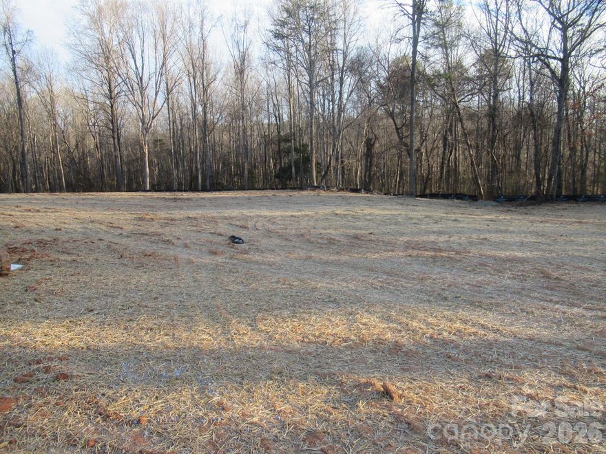 Fantastic Build-Ready Cul-de-Sac Lot in Western Lincoln County!  Discover this 4.7+ acre wooded lot tucked away just off Hwy 274 in northern Cherryville. Located in Western Lincoln County, this cul-de-sac property offers the perfect blend of privacy and convenience, just a short drive to Lincolnton, Cherryville, and South Mountain.  
The lot has been thoughtfully prepared for your future homesite, featuring a partially cleared building area, designated homesite, and silt fencing already installed for your builder. Septic Evaluation is completed and available for your building project.  With ample acreage, you have the flexibility to clear more or leave it wooded preserving the natural surroundings for added privacy and enjoyment.  Whether you’re planning a private retreat or a custom-built home, this property offers space, seclusion, and accessibility in a desirable rural setting. Bring your plans and start building your dream home today!