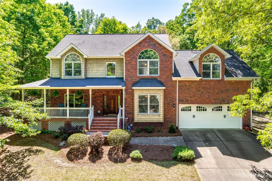 This beautiful 4 bed, 3 bath home, situated on spacious 1.02-acre wooded lot, provides immense privacy. The main level offers prefinished hardwood floors, office w/French doors, dining room, kitchen w/granite counters & stainless appliances (gas hookup available), built-in desk, dining area, laundry room & full bath. Great room w/gas fireplace which has been complemented by shelves & sliding glass doors for access to the backyard. The stairway off the great room leads to the primary bedroom featuring a vaulted ceiling, ensuite bathroom w/his & her closets & separate sinks along w/jetted tub & spacious shower. The other 3 bedrooms share a Jack-n-Jill bath. There is a second staircase leading up to an enormous Man-cave/office/bonus room. The backyard is fully fenced, boasting a heated ozone 5'5" deep pool, brick fireplace, patio; all providing you total privacy! Plenty of space for all your vehicles w/the attached 2 car garage & detached 2 car garage/shop suitable for boat/car storage.