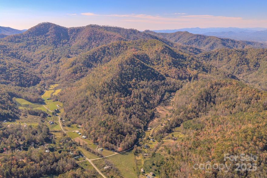 Excellent opportunity for unrestricted acreage less than 15 minutes to downtown Weaverville. Old road bed in place, ready to be upgraded for access to multiple home sites with long range view potential. +/-21 acres to be surveyed out of larger parcel. Multiple springs, mixed hardwoods, and peaceful setting. Seller is open to final acreage and seller financing. Showings are by appointment only and listing agent will accompany.