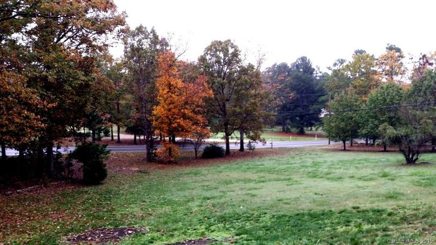 Looking for a LOT for a Little, with a country backdrop? Explore the possiblities. Land comes with double-wide. Wooded back, gravel driveway. Ready for your imagination.