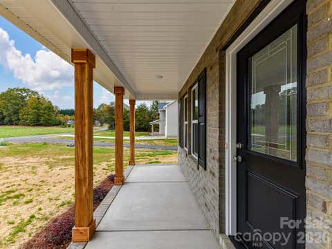 Photo of 573 Wade Road, Oakboro, NC 28129 (MLS # 4387993)