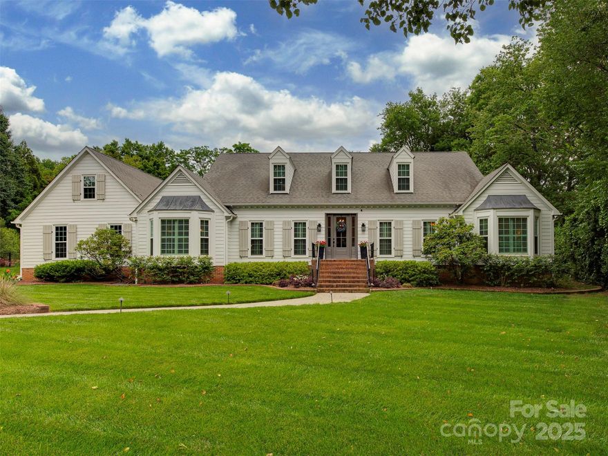 Nestled on a sprawling cul-de-sac lot in the sought-after Quail View neighborhood, this home has been updated from top to bottom and offers the perfect blend of luxury, comfort, and privacy. Inside, you'll find a bright, spacious interior featuring a large family room with built-in bar area, formal living and dining rooms, and the heart of the home - a fully renovated kitchen with high-end appliances. The home boasts four generously-sized bedrooms on the main level, including a dream of a primary suite. Additionally, you'll find multiple flex spaces upstairs including a theater/game room, craft/custom storage room, bar, updated full bath, and a bonus room that can double as a fifth bedroom. The outdoor space is perfect for relaxing and entertaining and includes a screened-in porch, an expansive outdoor patio with gas-starter fire pit, outdoor cooking area with a built-in Blackstone, and a 4-hole putting green. Don't miss out on this South Charlotte gem!