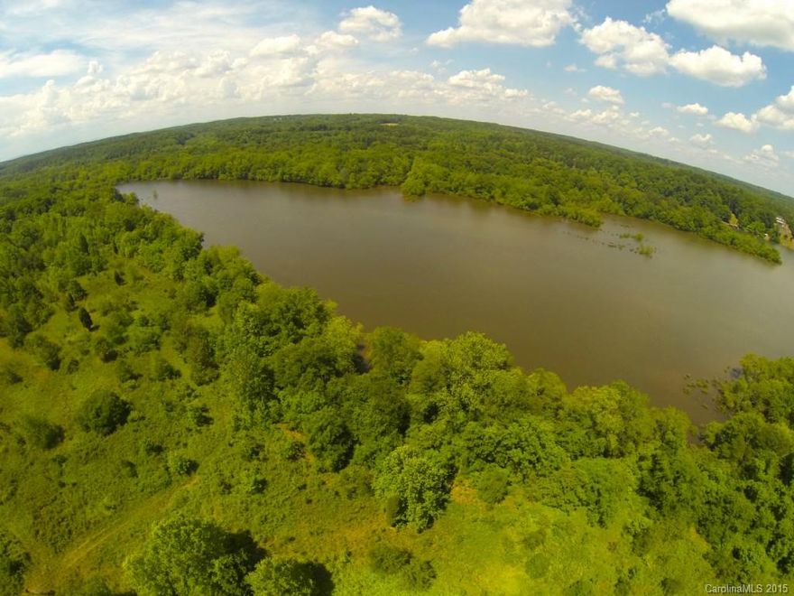 478 +/- Acres on Beautiful Lake Norman in Catawba County, NC. This tract is wooded with frontage on Lake Norman. Would make an excellent private estate, investment, or recreational tract. With over 1500 ft of frontage on Hudson Chapel Rd, the possibilities are endless. Timber on the property consists of managed pine and hardwood. Possibility of 1 community dock. Would need to be approved by Lake Authority. Please call listing agent for your private showing.