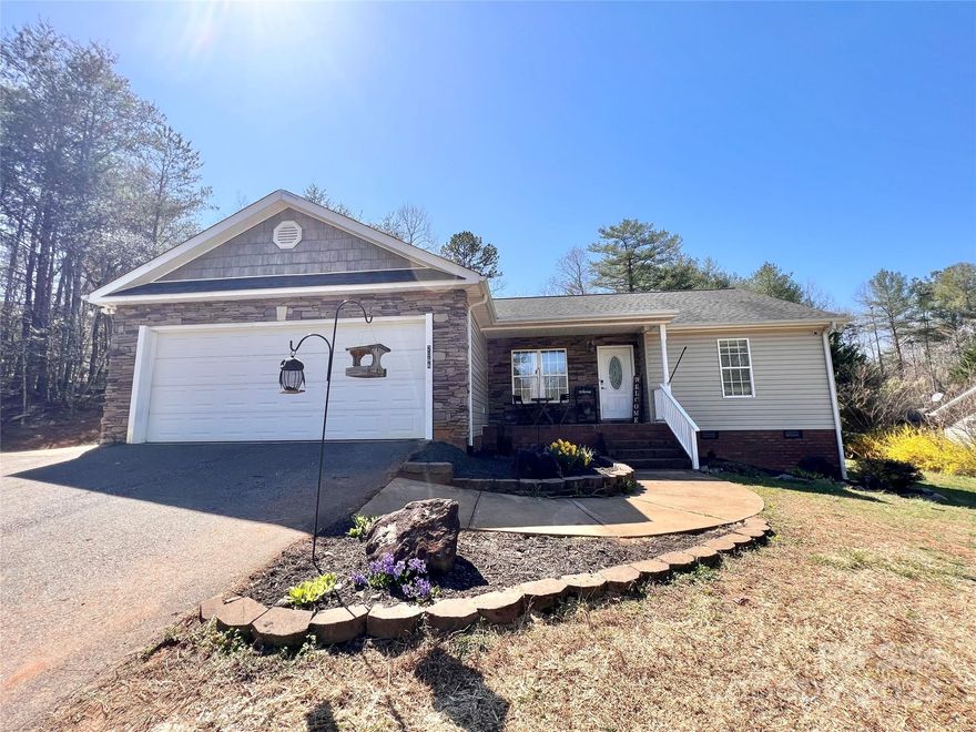 EXCELLENT CURB APPEAL ranch style home has LAKE ACCESS & won’t last long!! Easy living on one level! 3 bedrooms, 2 baths with primary suite featuring double vanity in bathroom & walk-in closet. Open floor plan with vaulted ceiling & popular split bedroom plan. Laundry located conveniently off the kitchen. Double parking on main level. Nice level back yard with privacy and above ground pool. Move-in ready! HOA is optional. $100 a year is to have a key and vehichle access to the private area by the lake. It includes a boat ramp, dock, covered sitting area with picnic tables. Seller states a future expansion will include bathrooms and lights.