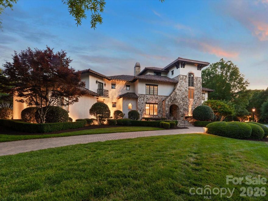 Situated within the prestigious guard-gated community of Longview, this exceptional luxury residence offers a rare combination of privacy, sophistication, and resort-style living in one of the Charlotte area’s most exclusive neighborhoods. Designed for both everyday comfort and elevated entertaining, the home features a well-proportioned layout with a luxurious primary suite on the main level, offering direct access to the expansive patio and stunning saltwater pool. From quiet mornings by the water to evenings entertaining guests under the Carolina sky, the outdoor living experience is truly exceptional. The backyard was designed to rival a private resort, featuring an extraordinary pool and spa project with integrated fire features and extensive hardscaping representing nearly half a million dollars in improvements. Outdoor living is elevated even further with a fully equipped kitchen featuring a new grill, pizza oven, refrigerator, and a smart-controlled fire pit that creates the perfect atmosphere year-round. Low-maintenance artificial turf adds both beauty and convenience to the outdoor space. Inside, the home blends timeless architecture with refined modern updates. Recent improvements include a new refrigerator, new double ovens and range, updated designer chandeliers throughout the entry, kitchen, breakfast area, and den, plantation shutters throughout the home and garage, custom draperies, and designer wallpaper accents in the powder room and third-floor bonus room. Beyond the home itself, Longview delivers a lifestyle few communities in the region can match. Known for its full-time guarded entrance, exclusivity, and exceptional amenities, residents enjoy a private country club atmosphere with beautifully maintained surroundings, golf, tennis, fitness, dining, and social events, all while remaining conveniently located near Charlotte.