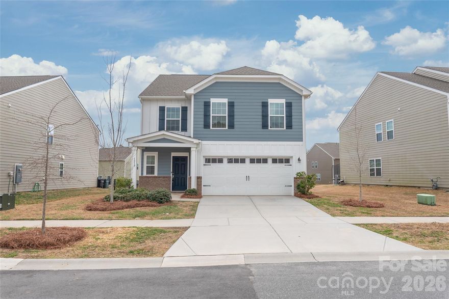Welcome to this beautifully maintained 5-bedroom, 2.5-bathroom home in Monroe’s sought-after Veronica Springs community, offering modern design, functional living space, and move-in-ready convenience.

Inside, you'll find luxury vinyl plank (LVP) flooring throughout the main living areas, creating a seamless and stylish flow. The open-concept floor plan connects the spacious living area to a well-appointed kitchen, perfect for everyday living and entertaining.

The modern kitchen features a large center island, granite countertops, stainless steel appliances including a gas range, tile backsplash, and shaker-style white cabinets. A refrigerator is included, making this home truly move-in ready. A convenient powder room is also located on the main level.

Upstairs, enjoy a generous loft or flex space, ideal for a second living area, home office, or playroom. The spacious primary suite offers a comfortable retreat with a private bath, while four additional bedrooms and another full bathroom provide plenty of space for family or guests.

Step outside to a large backyard perfect for relaxing, entertaining, or creating your own outdoor oasis.

Located in highly desirable Union County, this home offers easy access to shopping, dining, and US-74 for convenient commuting.

Move-in ready and in pristine condition—this home feels just like new construction without the wait.