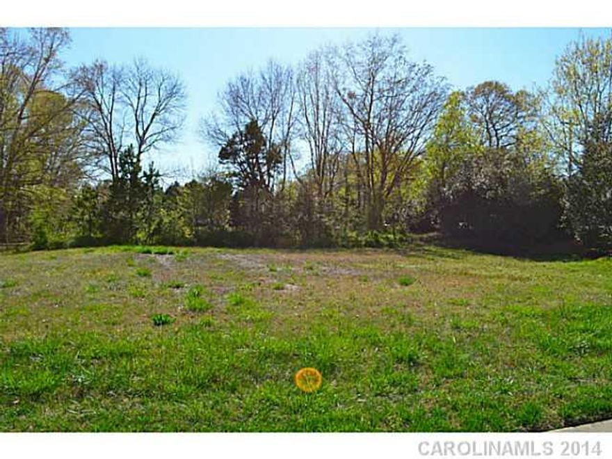 Beautiful flat corner lot w/trees. Only available lot iin Castle Cliff.