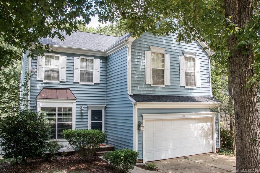 Private neighborhood.  Home is minutes from I-77, Rock Hill, Charlotte, NC and Fort Mill schools.   Bright & airy kitchen w/ceramic tile counters & decorative tiled backsplash.  Breakfast nook opens to tiled sunroom.  2 Story open FR w/gas log fireplace & tall windows offer beautiful view of large trees in shady backyard & lower patio area. Spacious carpeted master suite w/cathedral ceilings, dual sink, garden tub, separate shower & large walk-in closet. Flooring; hardwood, tile, carpet.