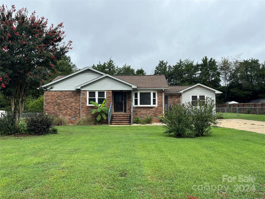 This one-story home, located in a quiet neighborhood with no HOA, is ready for new owners.  Featuring two bedrooms, two full baths, and a flex space with a closet that has been used as an office, it has so much potential for buyers.  With new flooring and HVAC in 2024, you can add your personal updates and make this house your next home. The two bathrooms have been updated with vanities and lighted mirrors and a tankless water heater has been installed.   A large fenced-in backyard with an above ground pool (that conveys as is) provides great space for many outdoor activities and two storage buildings will remain.  Come see what this home offers you!