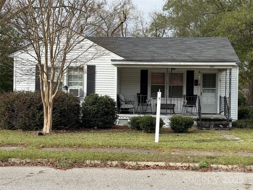 Don't miss this cozy 2B/2B home, on a corner lot with fenced in yard, in a lovely Bennettsville neighborhood and walking distance to town.  Enjoy your morning coffee sitting on the front porch of this adorable home. Great home for a first time home buyer.