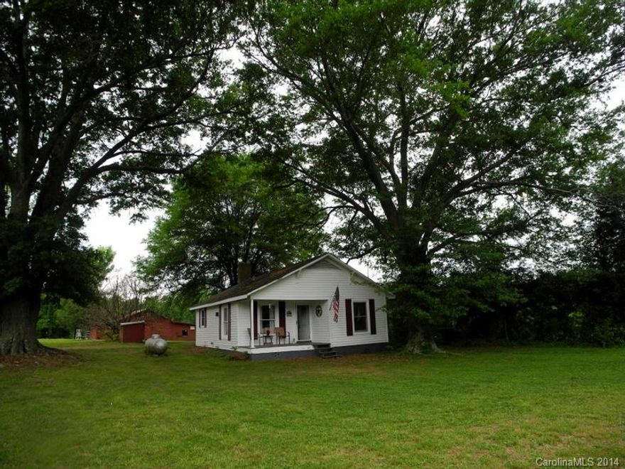 You have dreamed of owning your own farm, fall in love with the charm of this farm home, huge barn, 14.5 fenced acres & over 1300 feet of South Fork River frontage! This charming home has wood floors & a rocking chair front porch. This farm has a productive blueberry crop, extensive pasture land for all grazing animals & is crossed fenced. The original dairy barn needs some work, but it is a sturdy structure that has survived through the years. The smaller barn has hay storage & 2 stalls.