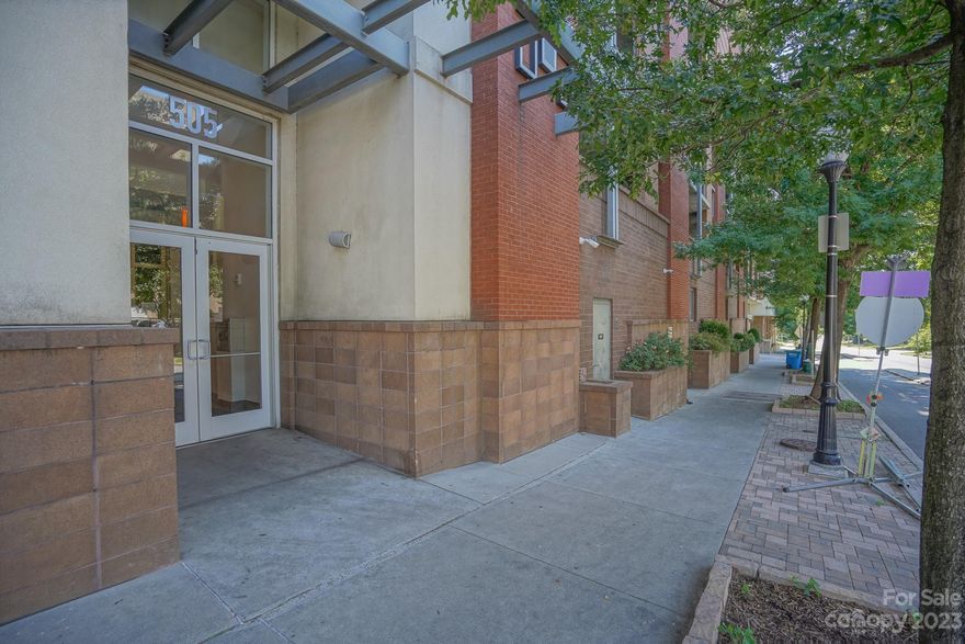 Uptown Uptown!  If you picture yourself in a fabulous condominium building, with amazing views, close to uptown, within walking distance to the light rail than look no further.  This one bedroom unit features stainless steel appliances, granite countertops, ceramic tile backsplash, hardwood floors, carpeting in the master bedroom, large balcony and washer & dryer in the unit.  Building is a secure building with a rooftop terrace, indoor parking garage and an Amazon Hub. Unit is being sold As Is.