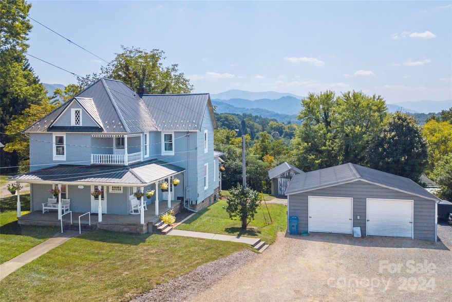 Step back in time with this 1912 two-story farmhouse, brimming with potential and nestled amidst picturesque mountain views. This home offers a unique opportunity for those looking to restore a classic. The main floor features a cozy 1-bedroom, 1-bath layout with a spacious kitchen, dining room, breakfast room, and living room—all with existing heat. Upstairs, you'll find three additional rooms and a half bath, though heat is not yet installed on this level.

The property also boasts a delightful wrap-around porch, perfect for enjoying the stunning mountain vistas from both the front and back of the home. A 915-square-foot detached workshop provides ample space for projects or storage.

Please note, this property is being sold "as-is" due to the need for repairs. It's ideal for cash buyers ready to invest in bringing this historic gem back to life.