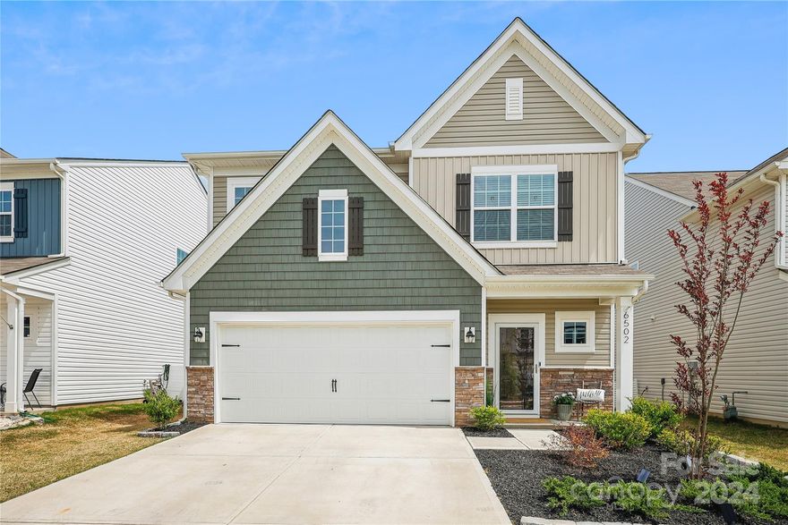 Discover Your Dream Home! No need to wait on building – this charming two-story residence offers ample space for your family to flourish. Boasting an expansive kitchen island, upgraded cabinets, and a cozy family room with patio access, this home is perfect for gatherings. Retreat to the secluded owner's suite downstairs, while upstairs, a versatile loft and three bedrooms await, each with walk-in closets. Community is located just a short drive from Charlotte and minutes from Ballantyne, this community offers resort-style amenities from a clubhouse to a zero entry swimming pool with a splash zone, meeting rooms, fitness center and playground as well as near by Walnut Creek County Park and miles of trails.  Don't miss out – make your dream a reality today!  Seller offering One year home warranty with AHS.