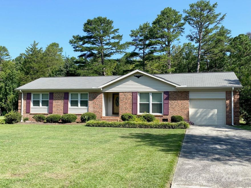 This beautiful brick home is nestled in a serene neighborhood and boasts ample living areas, featuring a spacious living room, a cozy family area with a fireplace, three bedrooms, and two full bathrooms. The primary bathroom has a walk-in shower.  The home sits on approximately 1.40 acres, the property includes a beautifully maintained yard and a large deck perfect for grilling and entertaining, relaxing, or just spending time with family & friends in your beautiful well-landscaped backyard with plenty of room for outside fun and games. Additionally, there is a storage building located in the backyard.

The home is conveniently located near restaurants, stores, health facilities, hospital, USCL, and with easy access to 521, and I-77.