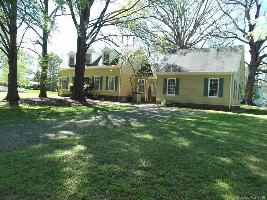 USDA approved area in quiet, established neighborhood. House is located on over 2/3 acre wooded lot with beautiful trees. Beautiful wood plank floors in living room, dining room & hallway. New granite counter top, Jenn Air stove w/downdraft & Bosch dishwasher in spacious eat-in kitchen. 2 car detached garage with upstairs storage area(future mancave??). No HOA. Convenient to I-485 Indian Trail & Mint Hill.