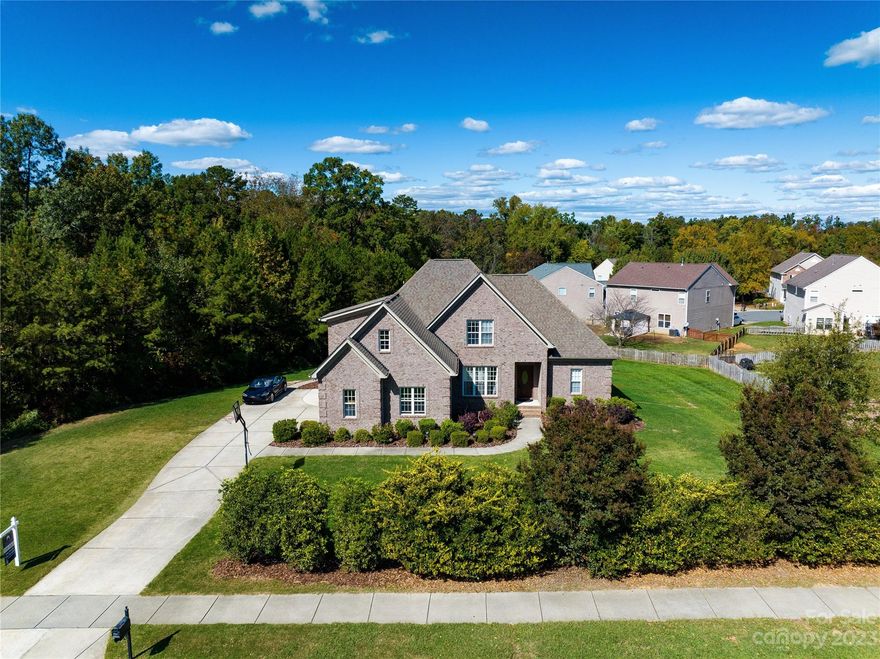 Discover Elegance in Indian Trail, NC: This beautifully REMODELED residence in the desirable Crismark community blends modern refinement with comfort. FRESHLY PAINTED WITH NEW CARPETS, This all-brick home features a generously sized primary suite on the main level, alongside two additional bedrooms. The second floor boasts a third bedroom, complemented by a spacious family room and extensive storage space, offering both comfort and practicality. The upgraded kitchen features modern countertops, and storage, ideal for culinary enthusiasts. 

The home also includes a refreshed sunroom, tailored for today’s work-from-home needs. Set on a nearly half-acre lot adjacent to a serene wooded area, the spacious backyard awaits your landscaping vision. Enjoy Crismark community's amenities including a pool, tennis courts, soccer field, and clubhouse, all within reach of top-rated schools. Welcome to your luxurious, updated haven in Indian Trail, NC.