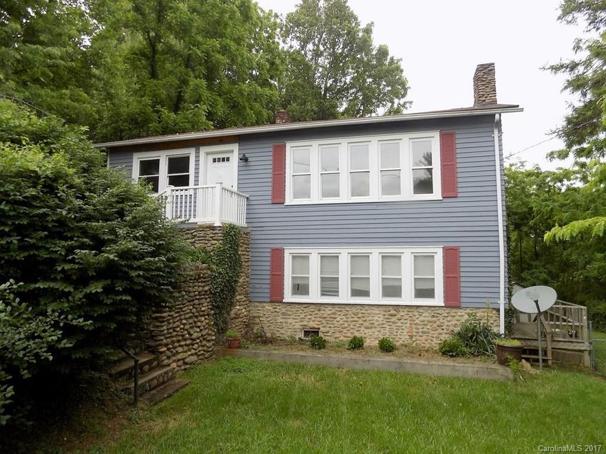 Nice location.  Three bedrooms, two baths with potential downstairs apartment.  Hardwood and tile with updated bath.  Remodeling in process but not finished.  Great potential for rental or live upstairs and rent downstairs.  Sold AS IS.