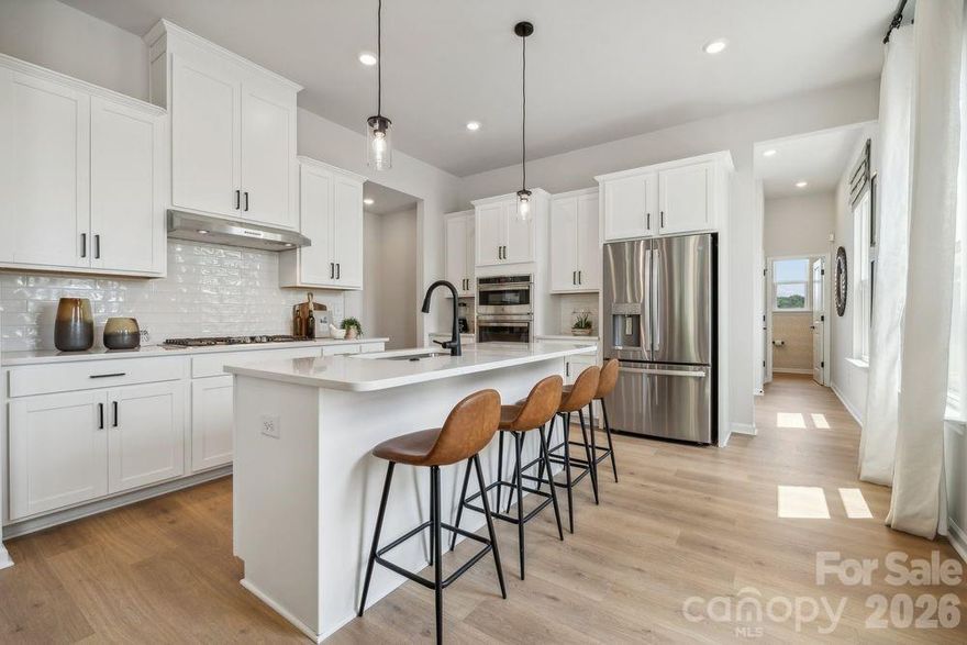 What’s Special: 1st Floor Primary Suite | End Unit | Loft | High Ceilings.
New Construction - Ready Now! Built by America's Most Trusted Homebuilder. Welcome to the Tahoe at 3150 Beacon Heights Road in The Ridge at Sugar Creek, a thoughtfully designed two-story townhome with a main floor primary suite. From the rear two-car garage, you’ll find a convenient drop zone and half bath before entering an open kitchen and casual dining area that flows into the great room. The first floor also includes a laundry room and a spacious primary suite with a private bath featuring dual sinks, a walk-in shower, and a generous closet. Upstairs, a bright loft offers space for relaxing or entertaining, along with two bedrooms, a full bath, flexible storage, and an additional guest suite with its own bath. The Ridge at Sugar Creek is a welcoming community with a new pool and cabana, plus a planned greenway trail, all just 4.5 miles from Ballantyne with easy access to I-77, I-485, and nearby dining, entertainment, and Ballantyne Corporate Park for convenient commutes to Uptown Charlotte. Additional highlights include: second suite with full bath on 2nd floor, ledge at primary shower. Photos are for representative purposes only. MLS#4318776