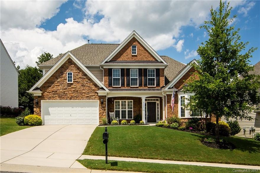 Gorgeous home in popular Belair neighborhood! Hardwood floors downstairs~upgraded trim and moldings~master bedroom and office/den downstairs~chef's kitchen w/granite counter tops, stainless appliances, gas range, island, & desk~two-story great room w/corner fireplace~butler's pantry~open floor plan~3 more BRs up plus bonus rm~2 walk-in attics~lovely fenced back yard w/fire pit & tree buffer~irrigation system~low Lancaster Co. taxes just minutes from Ballantyne~community pool & playground