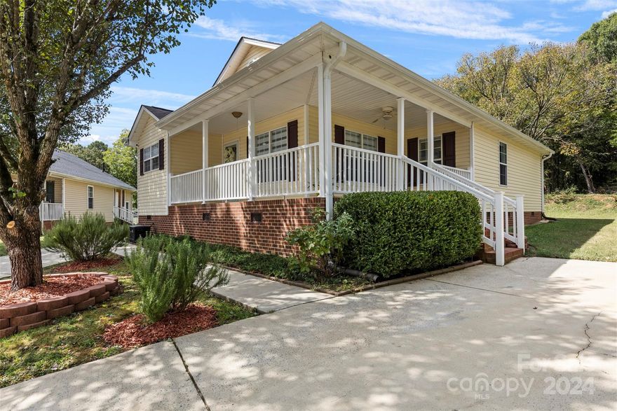 Prepare to be captivated by this charming, upgraded ranch-style home that embodies a lifestyle of comfort and style. These 3 beds, 2 bath move-in ready home boasts abundant natural light, new sliding door from the dining area to the deck, fresh paint, extensive moldings, custom tile flooring, updated kitchen countertops, back splash and bathrooms, automatic blinds in living room. new HVAC system, roof, gutters, and water heater! Nestled in a small and convenient neighborhood, this home exudes a sense of community and tranquility. The charming wrap-around front porch offers a perfect spot for relaxation, while the nearby downtown Mooresville provides easy access to amenities and activities. This show-stopping beauty is not just a house, but a home where memories are waiting to be made. With its efficient use of space and thoughtful design elements.  Schedule a showing today before this exceptional property is snatched up!