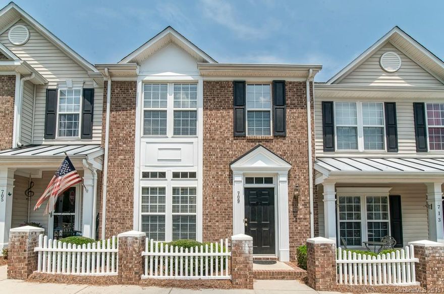 Well maintained and move-in ready Townhome in fantastic location! Walk to shopping, restaurants, movie theater and more! Spacious bedrooms and full bathrooms. Huge kitchen with large island...the perfect place for entertaining with friends. Home backs up to greenspace and rear of home is semi fenced offering nice privacy. Convenient to I-77, this townhome has it all, at a very affordable price!