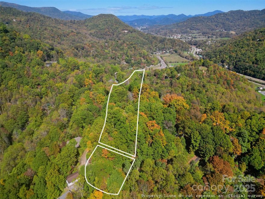 Perched atop a gentle mountaintop knoll, these two adjoining land parcels offer an exceptional opportunity to create your mountain retreat in one of Maggie Valley’s most desirable settings. Enjoy panoramic view potential spanning from the south to the northwest—perfect for capturing breathtaking sunsets and long-range vistas. The primary homesite area features a mild slope ideal for building, with easy paved access and minimal restrictions allowing for flexibility in design and use. Located just moments from the Maggie Valley Club and its resort-style amenities, this property provides both convenience and tranquility. With two parcels included, the possibilities are wide open—build two homes, cabins, or a private estate with room to grow, all in a serene setting that showcases the very best of mountain living.