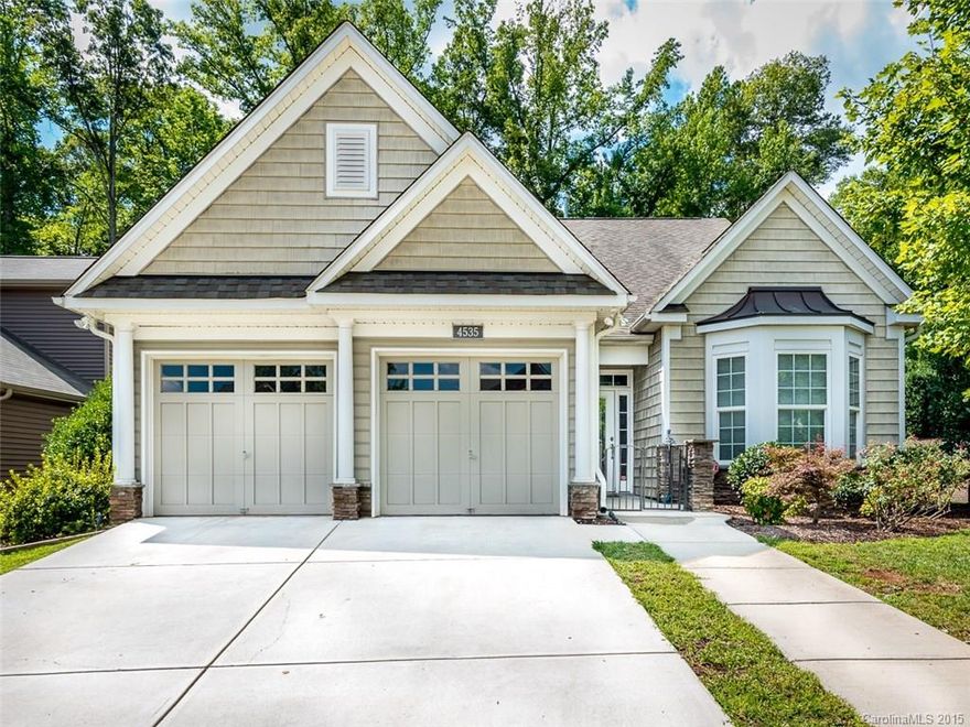 This Home is Absolutely Stunning w/Lots of Natural Light! Nothing Left Undone!  Former Model Home Boasts Outstanding Attention to Detail w/Hardwoods, Laminate & Tons of Crown Molding to Chef's Kitchen w/Granite, Tile Backsplash & Stainless to Large Breakfast Bar!  Fab Master Suite & 2nd Bedroom on Main Level! Upstairs Features Large Loft & Spacious Bedroom & Full Bath.  Tons of Storage & Large Closets! Sit in your Screened Porch w/Tiled Floor Overlooking Large Patio & Private, Fenced Backyard.