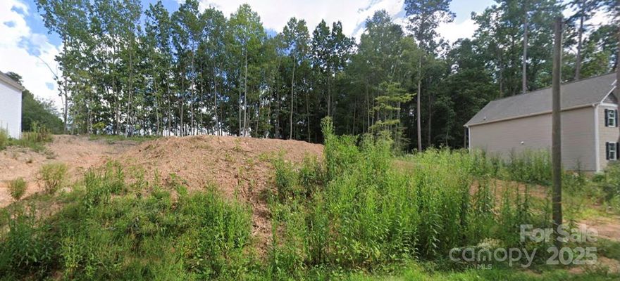 Rare opportunity to own a spacious .52-acre buildable lot. Surrounding homes sit on smaller parcels and have recently sold for $290K+, highlighting the strong value potential here. With ample room for your custom home and outdoor space, this property offers both privacy and investment upside. Convenient location with amenities nearby and ready for your vision.

Don’t miss this chance to secure one of the larger lots in the area—ideal for building your dream home or adding to your investment portfolio.