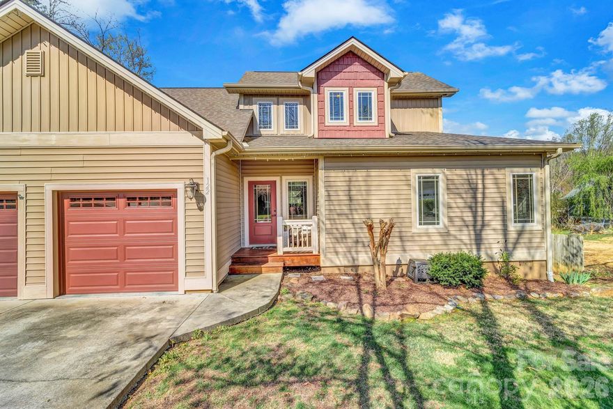 Ideally located in the heart of Black Mountain, this well-maintained duplex offers the rare combination of walkability, flexibility, and comfort—with sidewalk access just a short stroll to Lake Tomahawk and downtown Black Mountain. Enjoy easy access to trails, dining, shops, and community events right from your front door. This thoughtfully designed home features a primary bedroom on the main level, along with an open-concept living area highlighted by hardwood floors and a seamless, easy-to-maintain layout. The main level also includes a one-car garage for added convenience. Upstairs, you’ll find two additional bedrooms, a full bathroom, and a versatile bonus space perfect for a home office, library, media room, playroom, or fitness area—adaptable to fit your lifestyle. Outside, the fully fenced backyard provides privacy and functionality, ideal for pets, entertaining, or simply enjoying the outdoors from a covered back deck. With no HOA, low-maintenance living, and a highly desirable location, this property is perfectly suited as a full-time residence, lock-and-leave second home, or income-producing short-term rental (Airbnb). Opportunities like this in such a walkable Black Mountain location are hard to find.