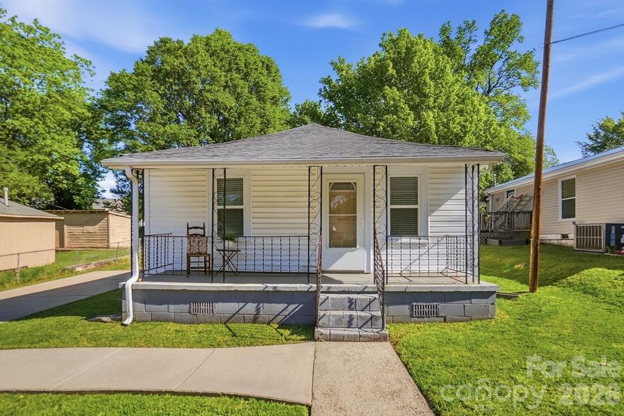 Step back in time with the perfect blend of vintage soul and modern updates. This 2-bedroom, 1-bath bungalow welcomes you with a classic wide front porch—perfect for morning coffee and neighborhood chats. Situated on a manageable .17-acre lot, this home offers the cozy footprint of yesteryear with significant updates already underway.  This home is located within walking distance of Ranlo playground, ball fields, and walking track.

Inside, you'll find beautiful wood trim and updated flooring that preserves the home’s historic warmth. The kitchen is a blank canvas ready for your final vision, with some components already on-site. Outside, the lot includes a practical utility building for extra storage. Whether you’re a first-time buyer looking to build sweat equity or a lover of historic homes, this gem is ready for its next chapter!
