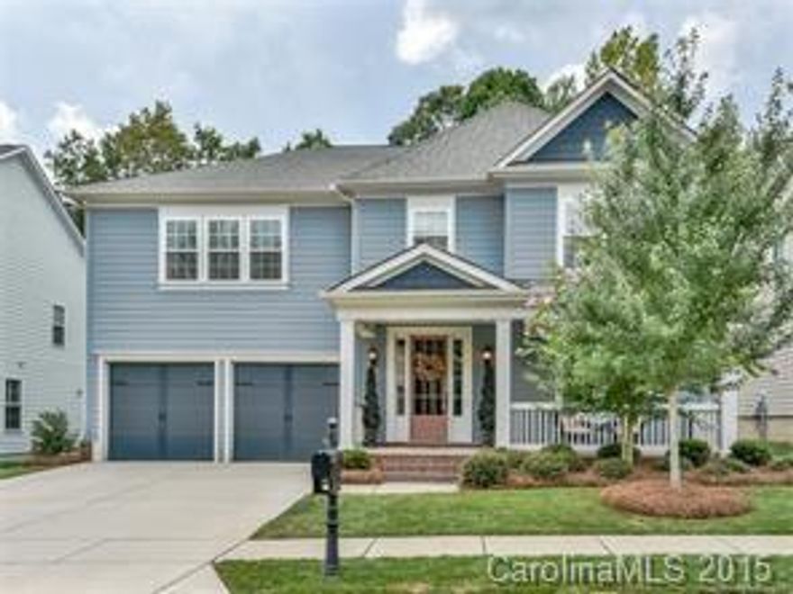 Beautiful Craftsman style home, with front porch, fenced back yard. Dark hard wood flooring on the main level, with formal Dining room, Living room / office space, and large kitchen which opens to the breakfast area and den.  Wonderful division of bedrooms on the second floor.  Open bonus room space on the 2nd floor as well. 
You won't be disappointed!