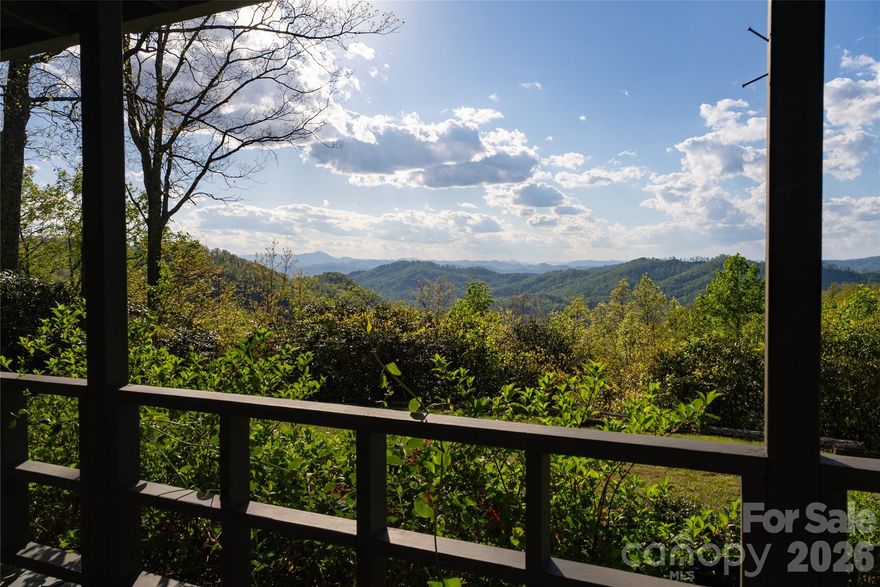 One of the most exceptional long-range view properties in Western North Carolina. Spanning over 43 private acres, this offering features a charming 3-bedroom, 2-bathroom cottage ideally positioned on a level overlook with sweeping western-facing views stretching to Mt. Pisgah and beyond.

The property presents additional homesite potential along the upper ridge, offering similarly expansive—if not superior—long-range vistas. The existing cottage is functional and well-maintained, providing a solid foundation for the next owner to update and personalize. The washer and dryer are in the well house to the rear of the home. 

A small stream runs along the lower portion of the property near the base of the driveway, enhancing the natural setting. Interior features include heart of pine floors and a classic brick fireplace, all complemented by some of the most breathtaking sunset views in the region.

Properties offering this combination of acreage, accessibility, existing residence, and dramatic long-range views are increasingly rare to the market.